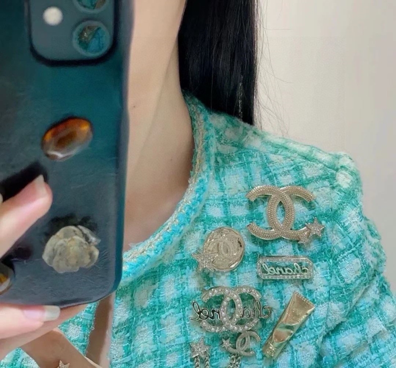 Ch**el brooches